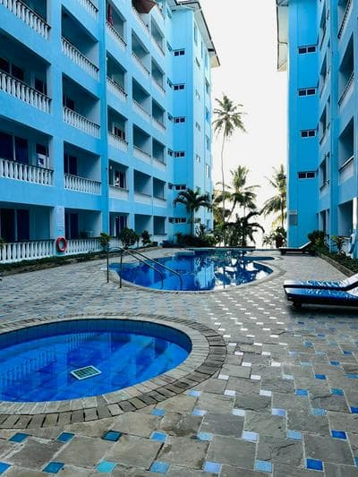 Cowrie Shell Beach Apartments Official