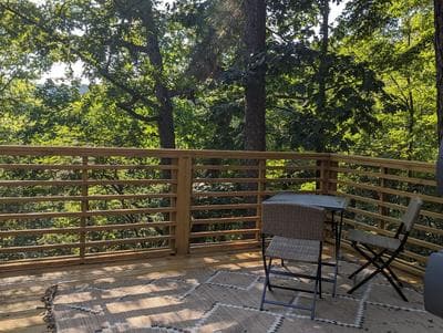 Cabin #6 with hot tub deck and sunset view at Loblolly Pines