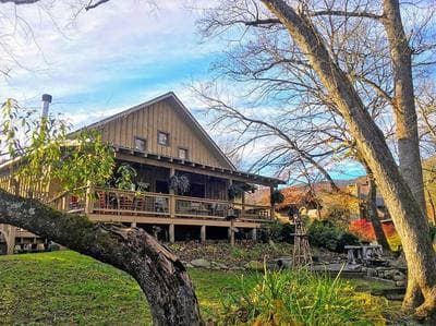 Water's Edge, Covered Porch, Deep Creek as your Backyard Haven, Hot Tub, Pool Table, Fire Pit, Close to Town & Entrance to National Park