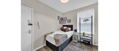 Minimalist Oasis: Airy Studio in Calming Neutrals