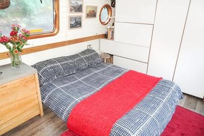 Slash Arts houseboat on secluded mooring in central London