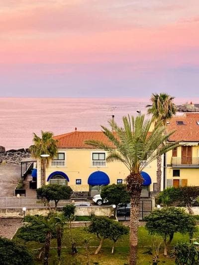 STYLISH SEA & ETNA VIEW HOME with PATIOS & PARKING