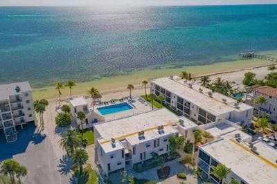 Relaxing beachfront getaway with heated pool #4