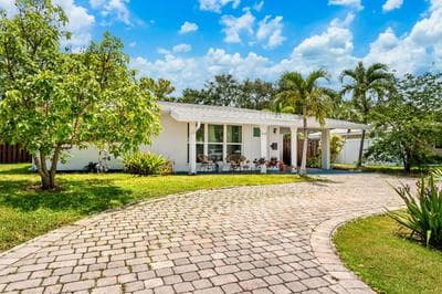 Eccentric home with pool tiki hut & outdoor kitchen