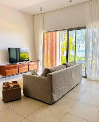 Beachfront Apartment with Garden & Direct Beach Access