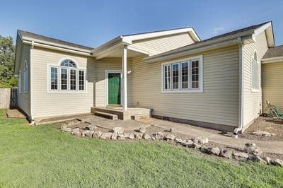 Holiday Island Home w/ Screened-in Deck & Fire Pit