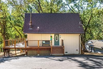 Cozy Cabin On The Cove - Lakefront with Private Dock by Yosemite Region Resorts