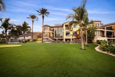 Luxurious 3-story Estate With Gym Pool Slide Private Beach and Lighthouse Views
