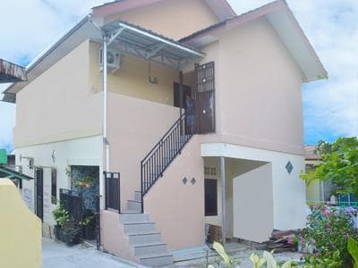 SPOT ON 91616 Kharisma Guest House