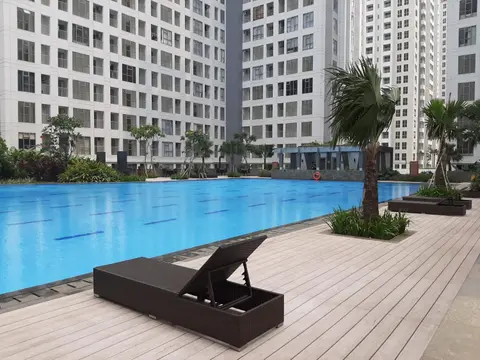 Comfy Studio Apartment with Extra Bed at M-Town Residence By Travelio