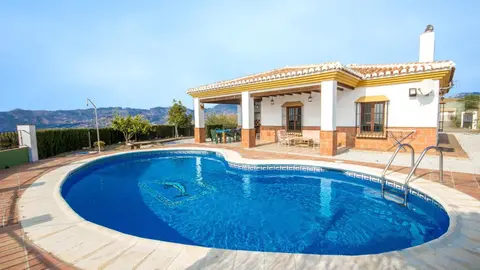 Casa Adrian Almachar by Ruralidays