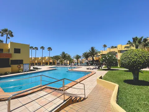 Seaside Apartment Corralejo : A cozy holiday home in a peaceful well located green complex