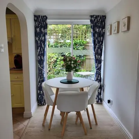 Cheerful, cosy, one bedroom home with patio and parking