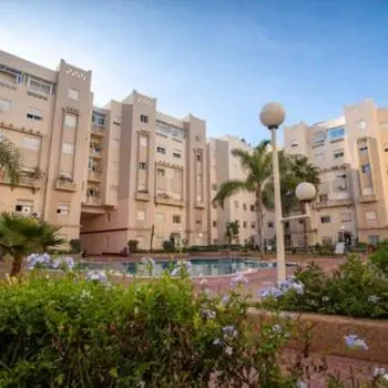 Appartement au rdc de la résidence Rosiers avec piscine à Monammedia