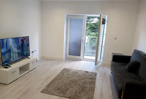 A beautifully furnished master bedroom in a shared apartment