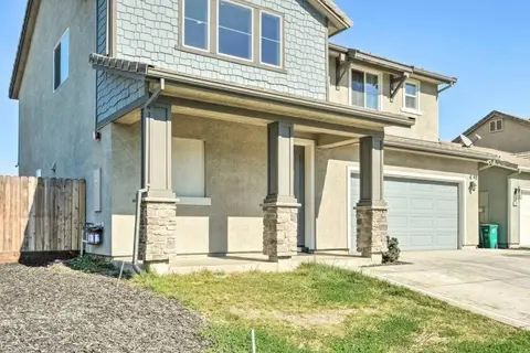 New Family Home with Patio & Yard!
