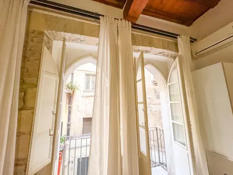 Kalma Via Manno - Central Stay with Stone Walls & Private Cinema
