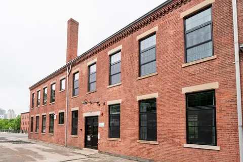 Jennifer's Historic Loft Glass Bedroom