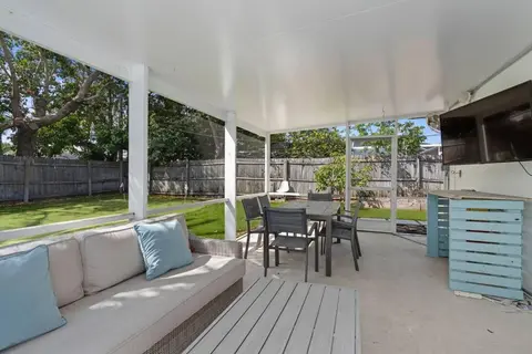 Pool home with putting green and home gym office