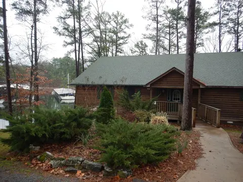 Lake view three bedroom, three bath Harbor North luxury cottage with private hot tub overlooking Lake Ouachita. by RedAwning
