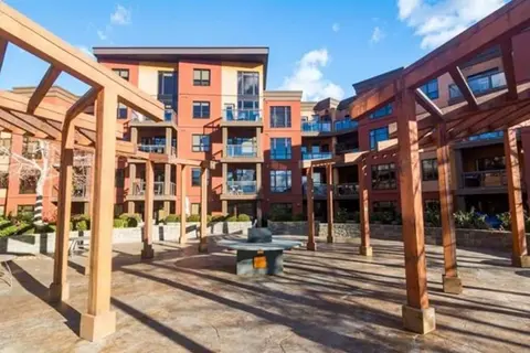 Ground Level Condo Backing Onto Creek #122