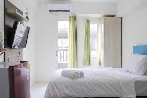 Warm and Nice Studio at Podomoro Golf View Apartment