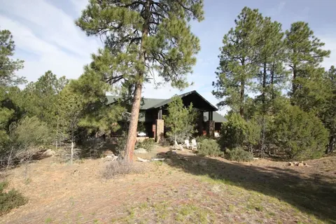 At Whispering Pines 4 Bedroom Home by RedAwning