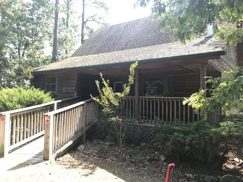 Lake view two bedroom, two bath Harbor North luxuryloft cottage with private hot tub overlooking Lake Ouachita. by RedAwning