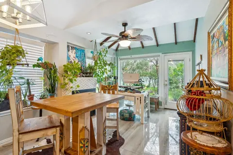 Eclectic Oasis: Artful & Colorful Comfort 3 Bedroom Home by RedAwning