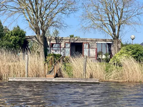 2 Pers - House König Lakeside of the Lauwersmeer With own Fishing Pier Sauna