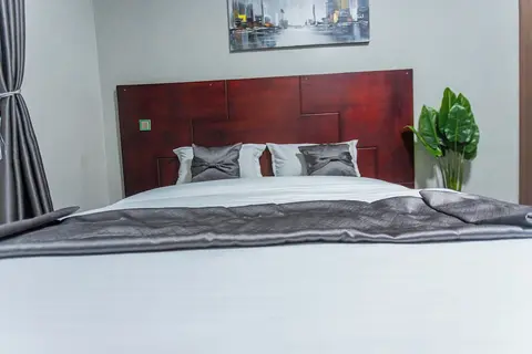 The Den Soroti White