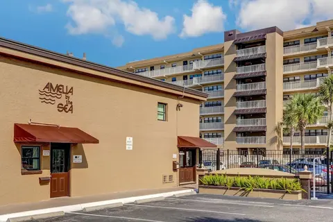 Upper Unit Condo Overlooking Both the Ocean Pier and Swimming Pool by RedAwning