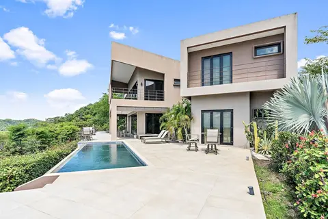 Luxury 5BR Oceanview Villa with Infinity Pool, King Beds, and Sunset Views Over Playa Prieta