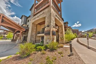 Steps to skiing, resort property, mountain views, shared hot tub, sauna, steam room 223