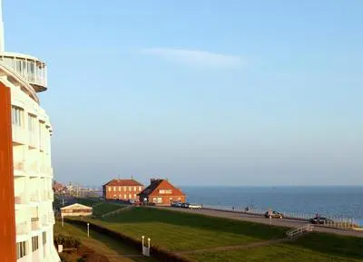 Exklusive Ferienwohnung am Südstrand mit Wintergarten, Balkon & Meerblick Wohnung 22