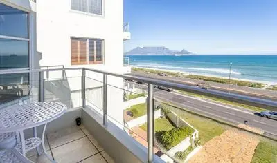 Bloubergstrand Beachfront Apartment with Secure Garage and Pool