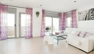 Modern Duplex in Sitges with Private Parking, Sea Views & Terrace