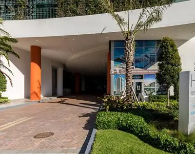 Wake Up to the Sound of Waves in a Stylish Condo in a Luxury Resort