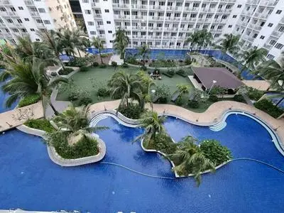 Industrial Design Bachelor's Pad with Pool View in Shore Residences