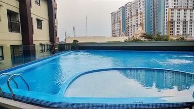 Nice and Cozy 2BR Apartment at Atria Residence Gading Serpong By Travelio