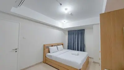 Spacious and Homey 2BR at Podomoro City Deli Medan Apartment