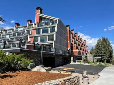 DELUXE SLOPESIDE Condo with 4th FLOOR VIEWS, Elevator and Underground Parking at Canyon Lodge (1849 Condos 409) by RedAwning